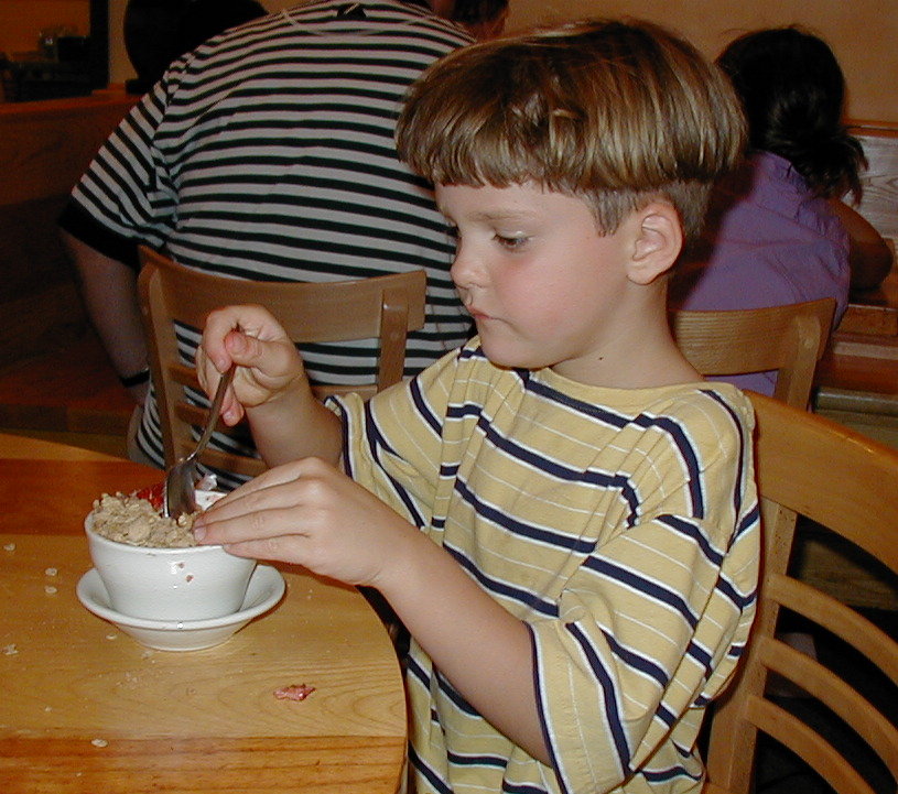 Picture of Kyle Eating Peach Plum Crisp at Moosewood